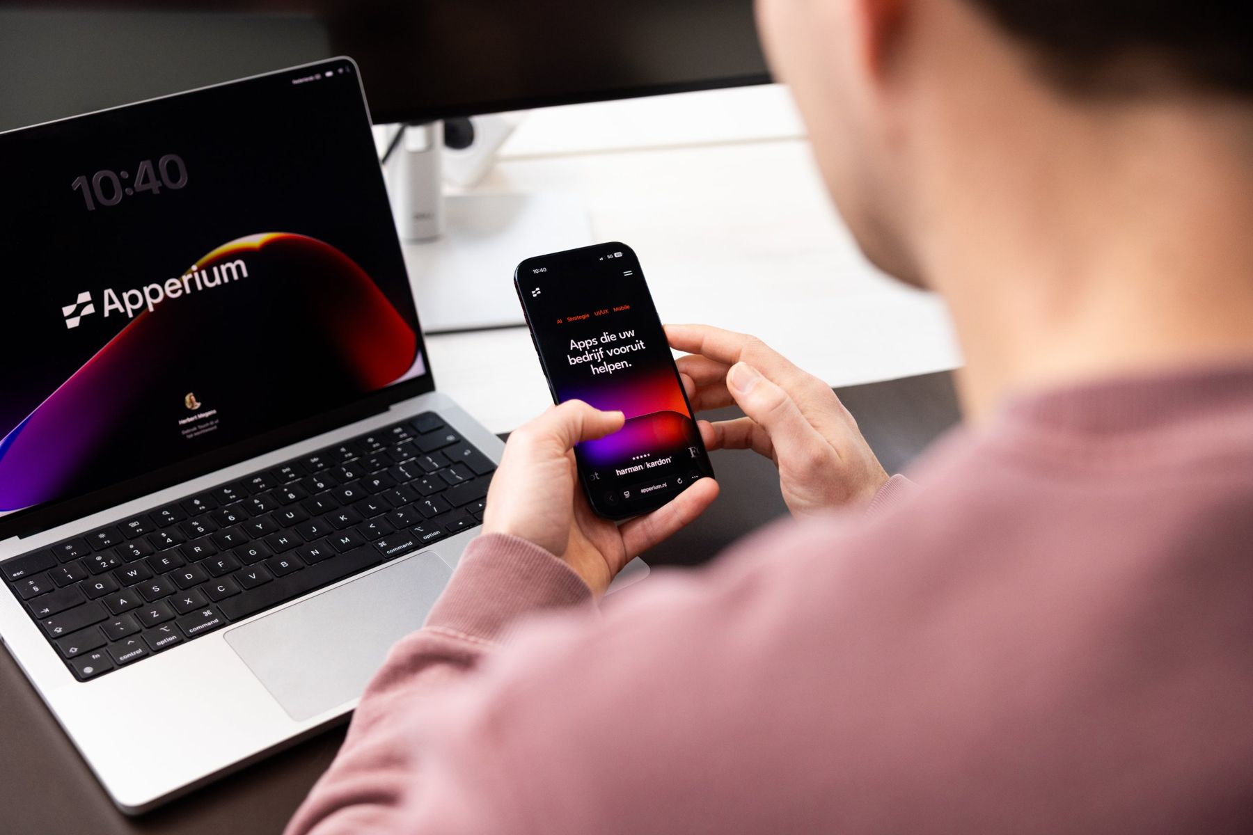 Apperium op laptop en telefoon